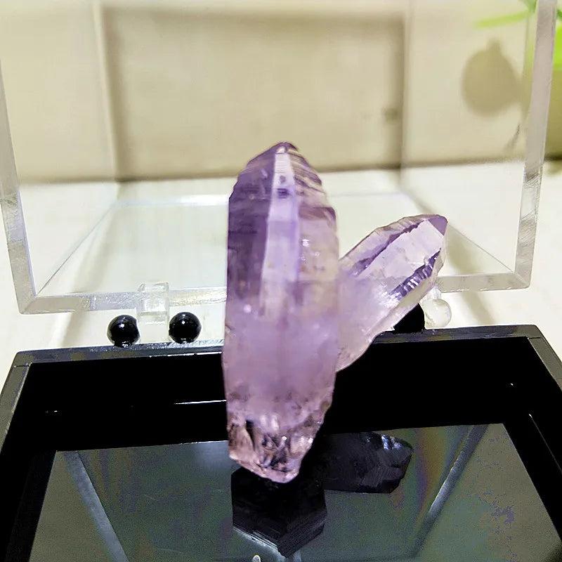 Raw Vera Cruz Amethyst crystal cluster with pale lavender, transparent points for high-vibration spiritual healing.