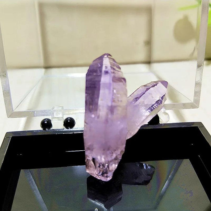 Raw Vera Cruz Amethyst crystal cluster with pale lavender, transparent points for high-vibration spiritual healing.