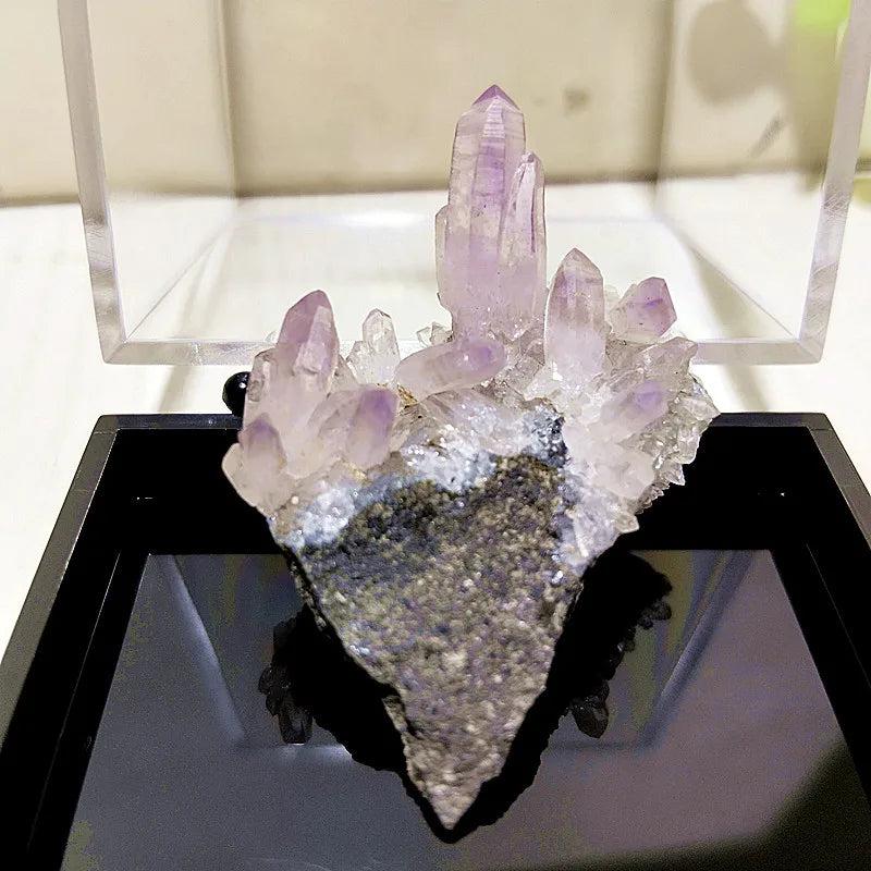 Raw Vera Cruz Amethyst cluster with pale lavender points, perfect for high-vibration spiritual healing and meditation.
