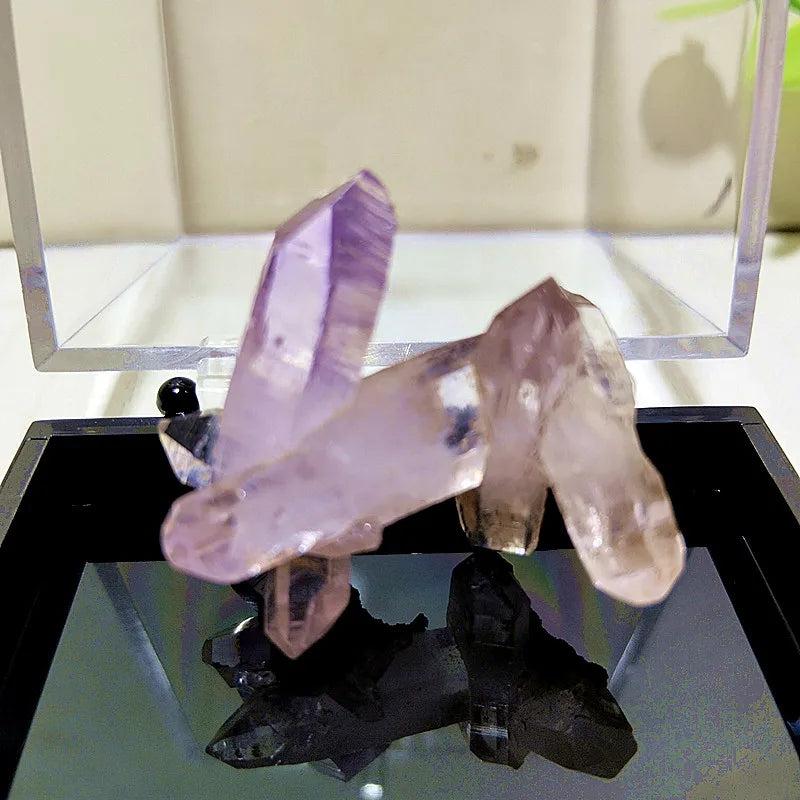 Raw Vera Cruz Amethyst crystal cluster with pale lavender, transparent points for high-vibration spiritual healing.