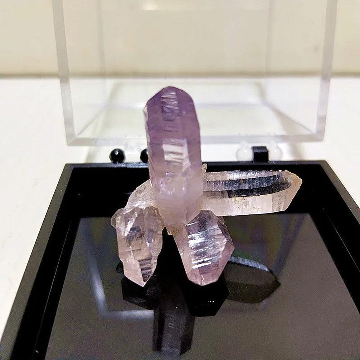 Raw Vera Cruz Amethyst cluster with pale lavender, transparent points for high-vibration spiritual healing and energy.