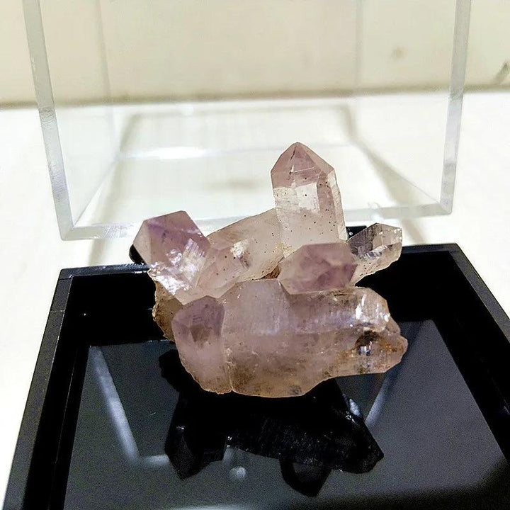 Raw Vera Cruz Amethyst cluster with pale lavender, transparent points for high-vibration spiritual healing and peace.