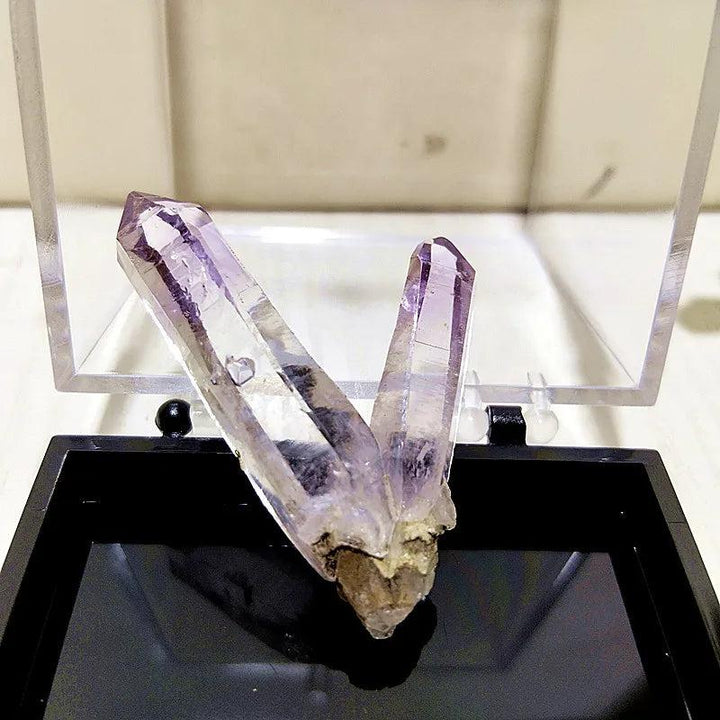 Raw Vera Cruz Amethyst crystal cluster with pale lavender, transparent points for high-vibration spiritual healing.
