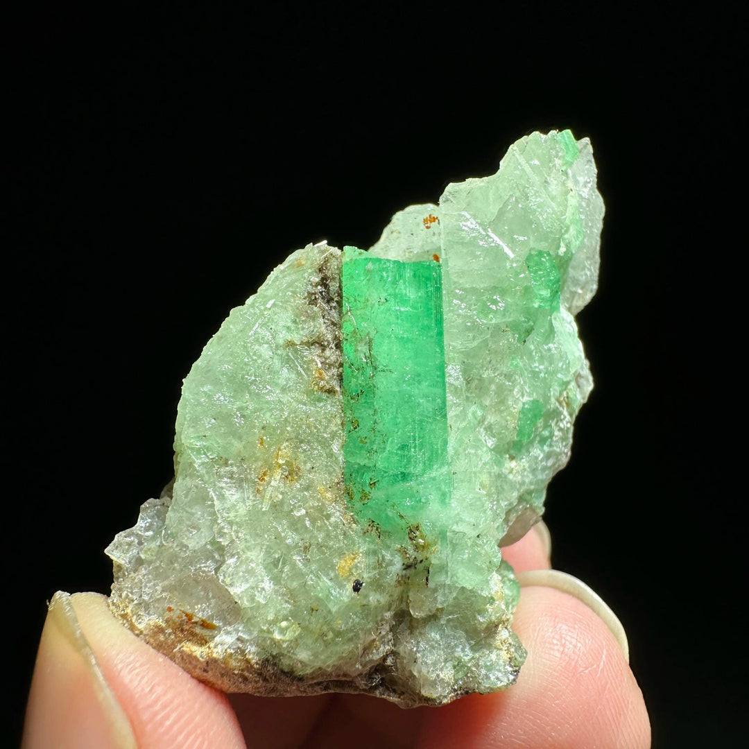 Raw Verdite mineral specimen featuring a vibrant green crystal structure for heart chakra grounding and abundance.