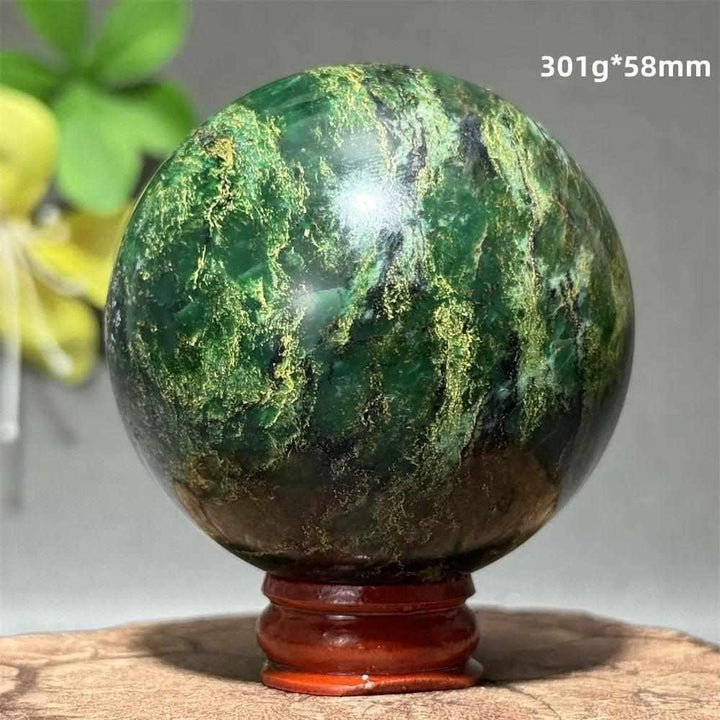Polished 58mm Verdite sphere featuring deep green natural shading for grounding and heart chakra healing.