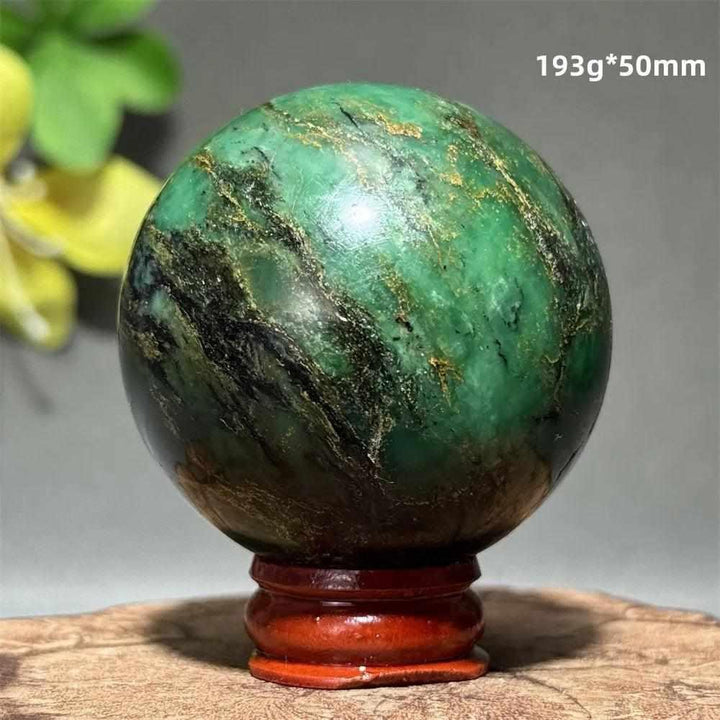 Polished 50mm verdite sphere with deep green natural shading, perfect for grounding and heart chakra meditation.
