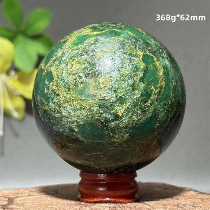 Polished 62mm Verdite sphere in deep green with natural shading, perfect for Heart Chakra grounding and meditation.