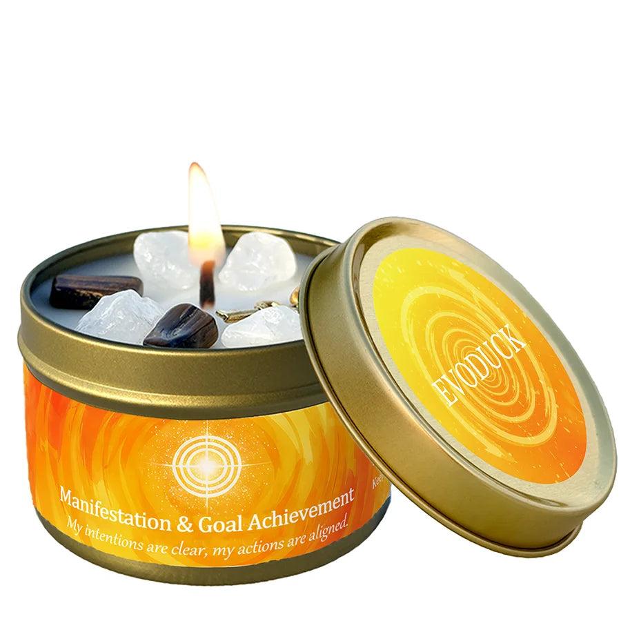 Vetiver Cedarwood crystal-infused intention candle in a gold tin, featuring clear quartz and dark stones for manifestation.
