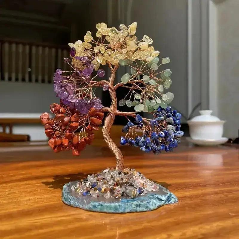 Handcrafted 110mm 7 Chakras Bonsai Tree with mixed gemstone leaves on a copper wire trunk and blue crystal base.