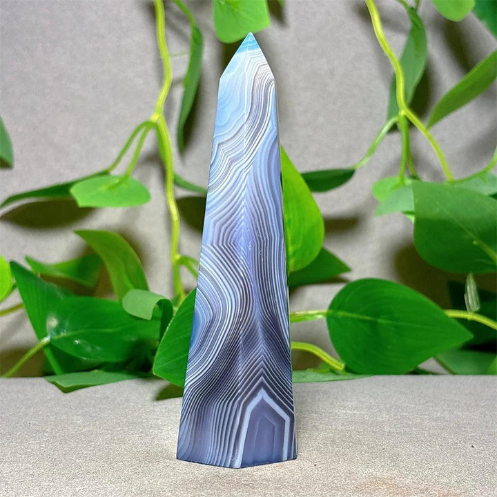 Violet Line Agate Tower Crystal, a natural stone quartz obelisk for home decoration and energy healing.