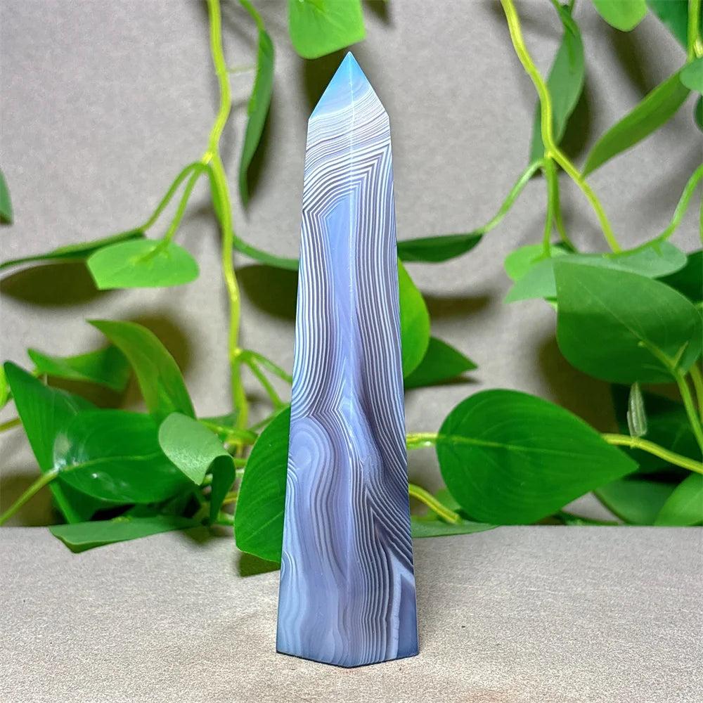 Violet Line Agate Tower Crystal, a natural stone quartz obelisk for home decoration, Reiki, and energy healing.