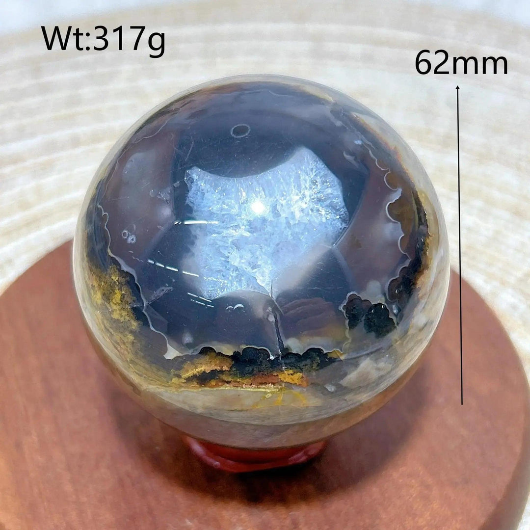 Volcanic Agate Sphere, 62mm, 317g, with earthy bands and a glowing, silica-rich core, grounding and transformative.