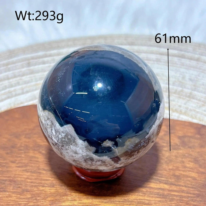 Volcanic Agate Sphere, 61mm, 293g. Deep blue and white banded crystal ball, grounding and transformative.