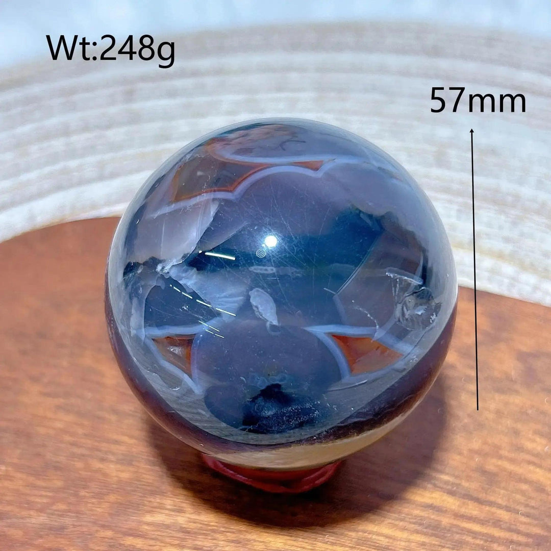 Volcanic Agate Sphere, a UV reactive crystal ball, 57mm, 248g. Richly banded, earthy sphere, grounding and transformative.