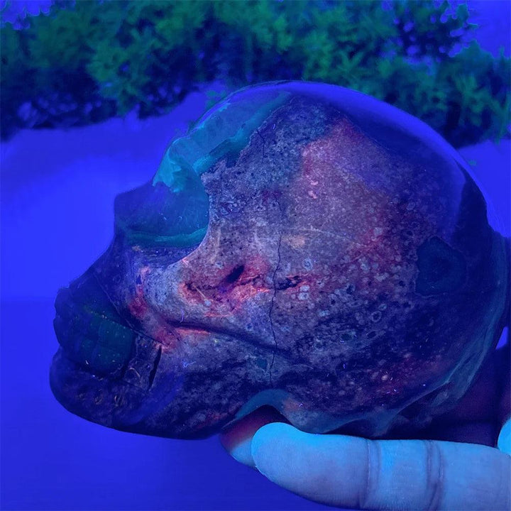 Hand-carved Volcano Agate and Calcite crystal skull, featuring natural earthy tones and vibrant healing energy for home decor.