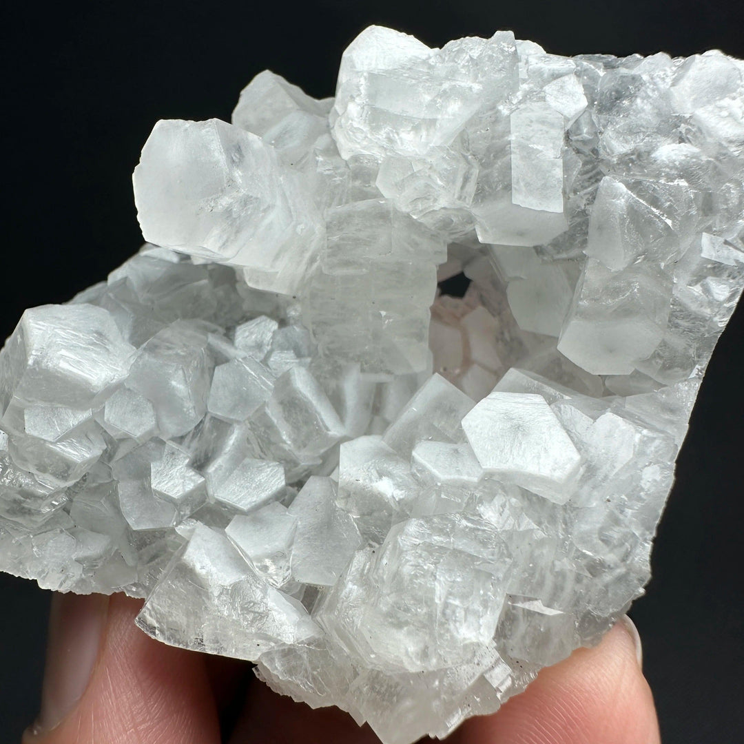 Raw white calcite crystal cluster healing stone specimen with sparkling cubic formations.