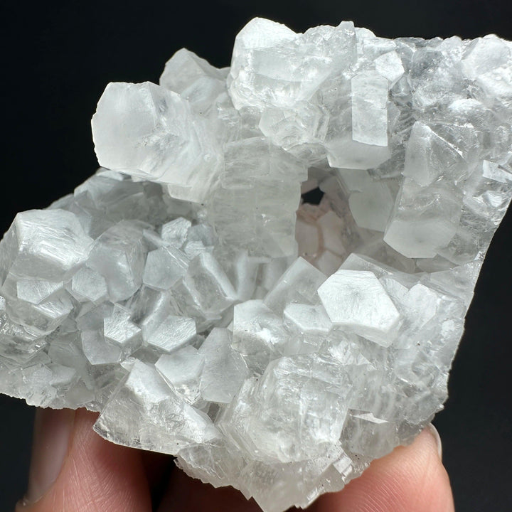 Raw white calcite crystal cluster healing stone specimen with sparkling cubic formations.