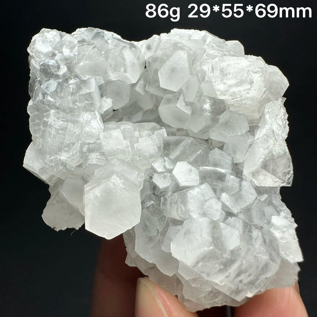 Raw white calcite crystal cluster specimen, a healing Reiki stone for home decor.