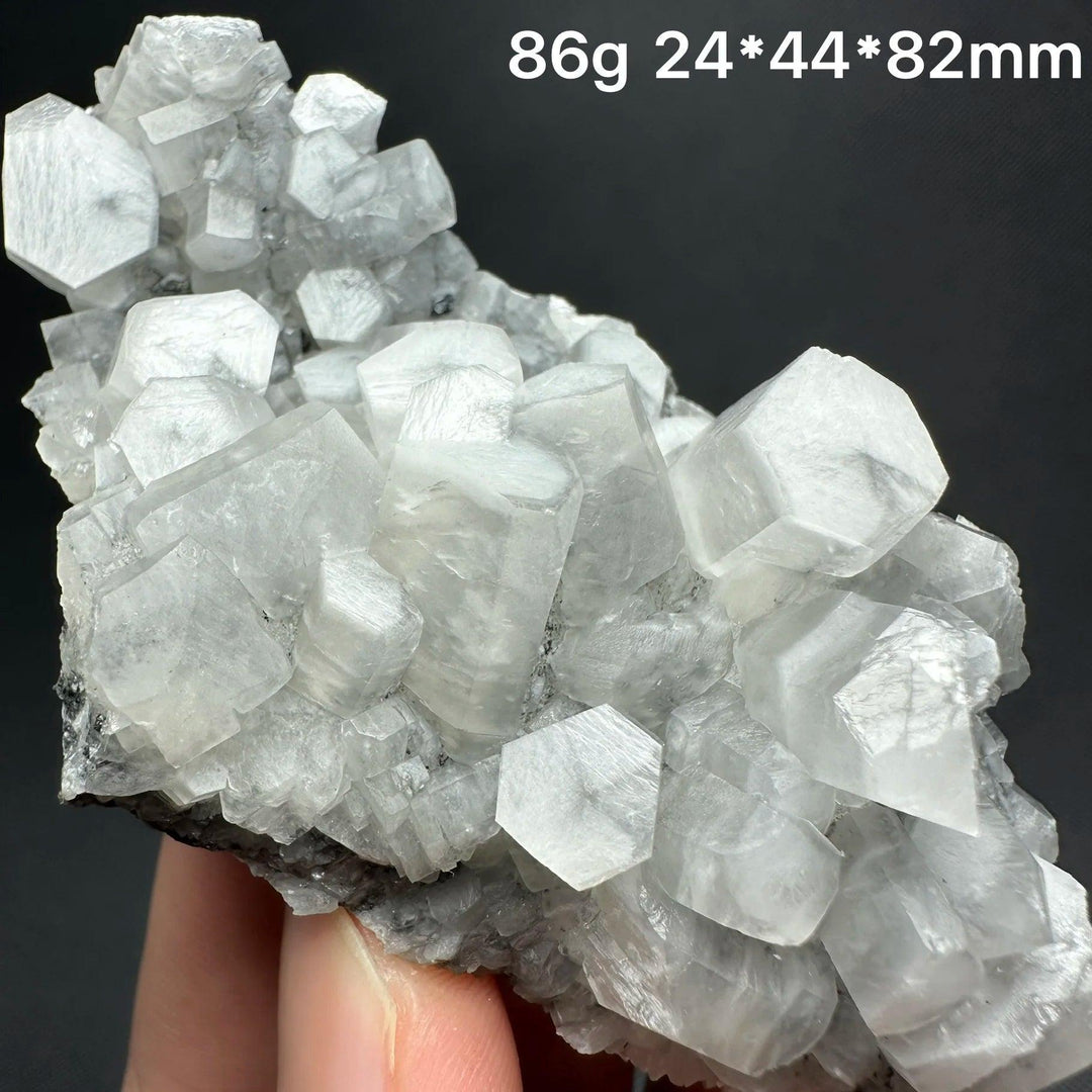 Raw white calcite crystal cluster specimen, a healing reiki stone for home decor.