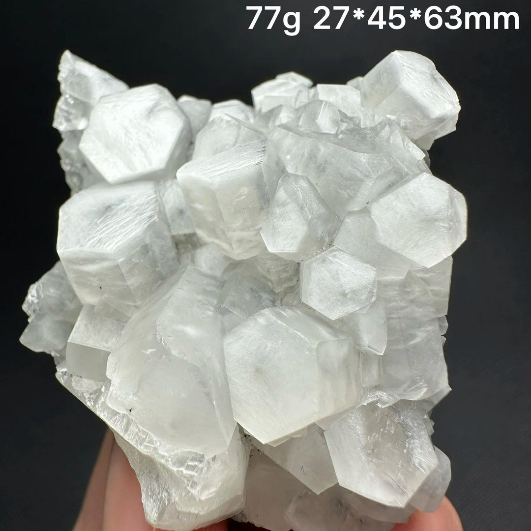 Raw white calcite crystal cluster healing stone specimen with natural hexagonal formations.