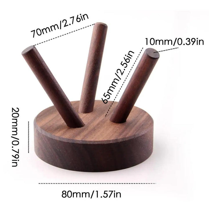 Dark brown wooden crystal display stand with three angled pegs, showing dimensions for size and design.