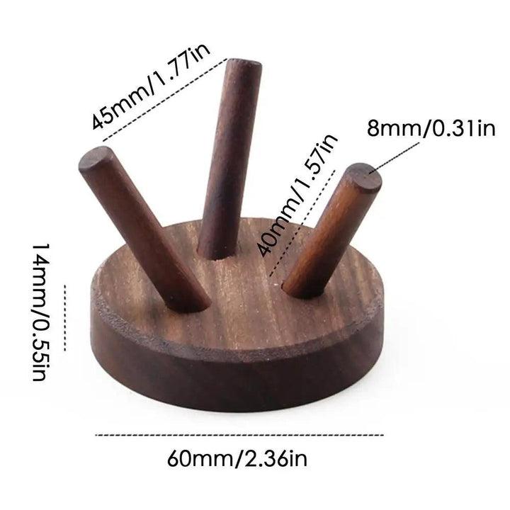 Dark brown wooden crystal display stand with three pegs, showing dimensions for height, width, and peg thickness.
