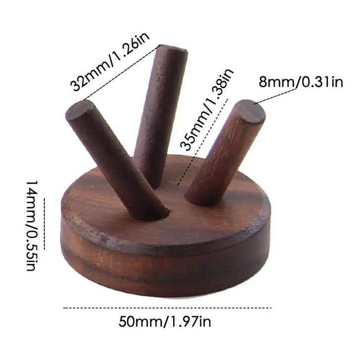 Small dark wood crystal display stand rack with three pegs, showing dimensions in mm and inches.