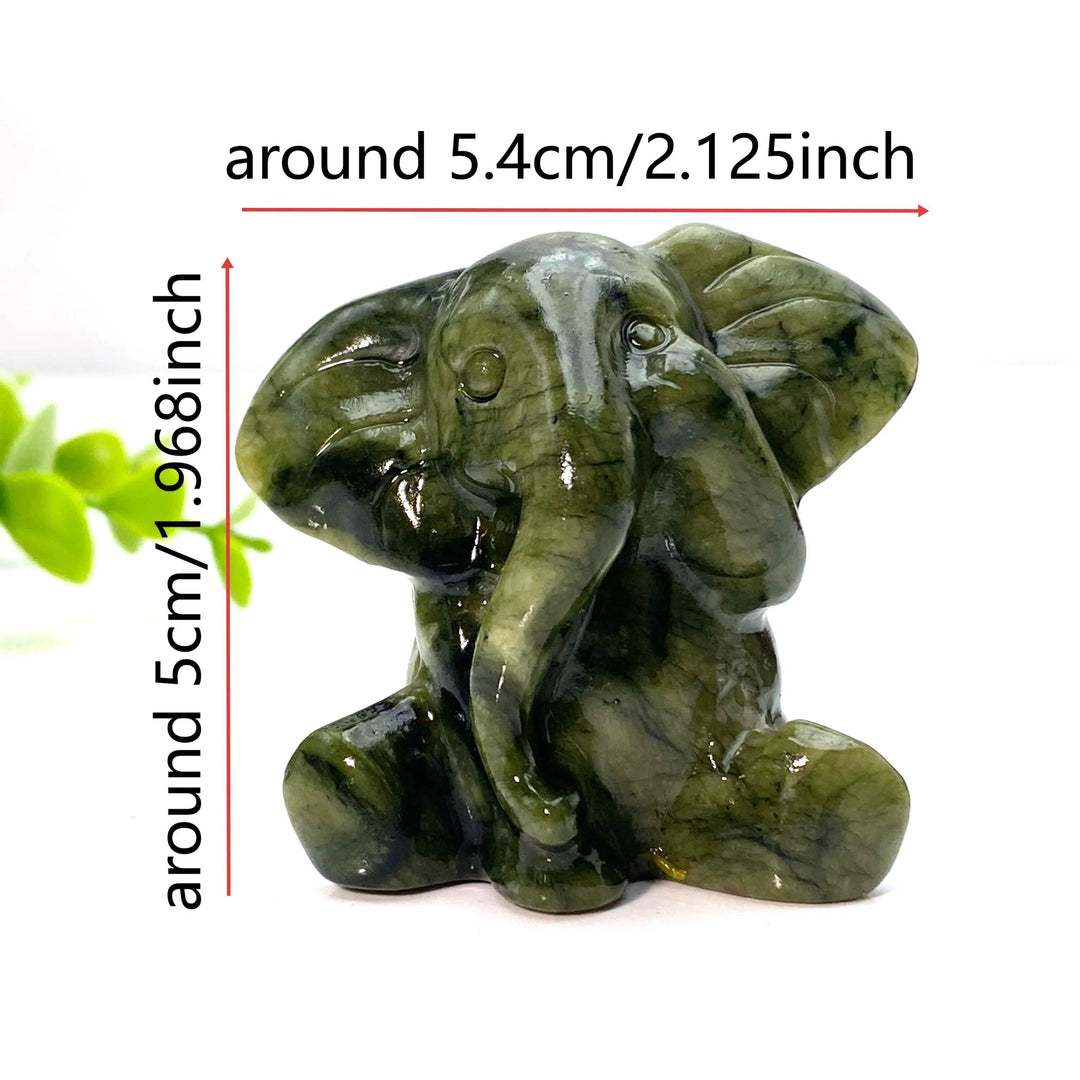 Xiuyan Jade Crystal Carved Elephant Statue: deep green, waxy jade elephant for luck, wisdom, and protection.