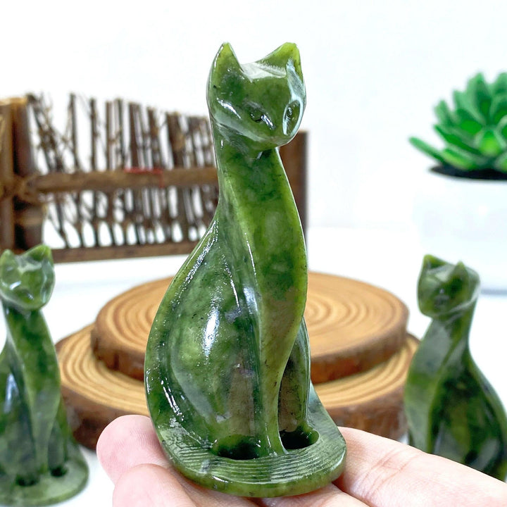 Hand-carved Xiuyan jade Egyptian cat figurine, dark green crystal, for home decor or gift.