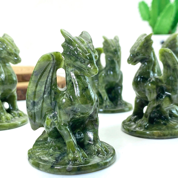 Green Xiuyan Jade Pterosaur Dragon carving, a natural crystal animal figurine for decor and gifting.