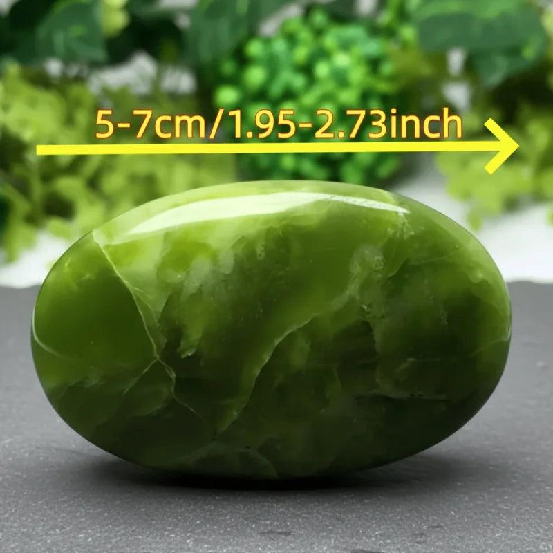 Polished green Xiuyu palmstone crystal, a soothing 5-7cm healing stone for boho home decor.