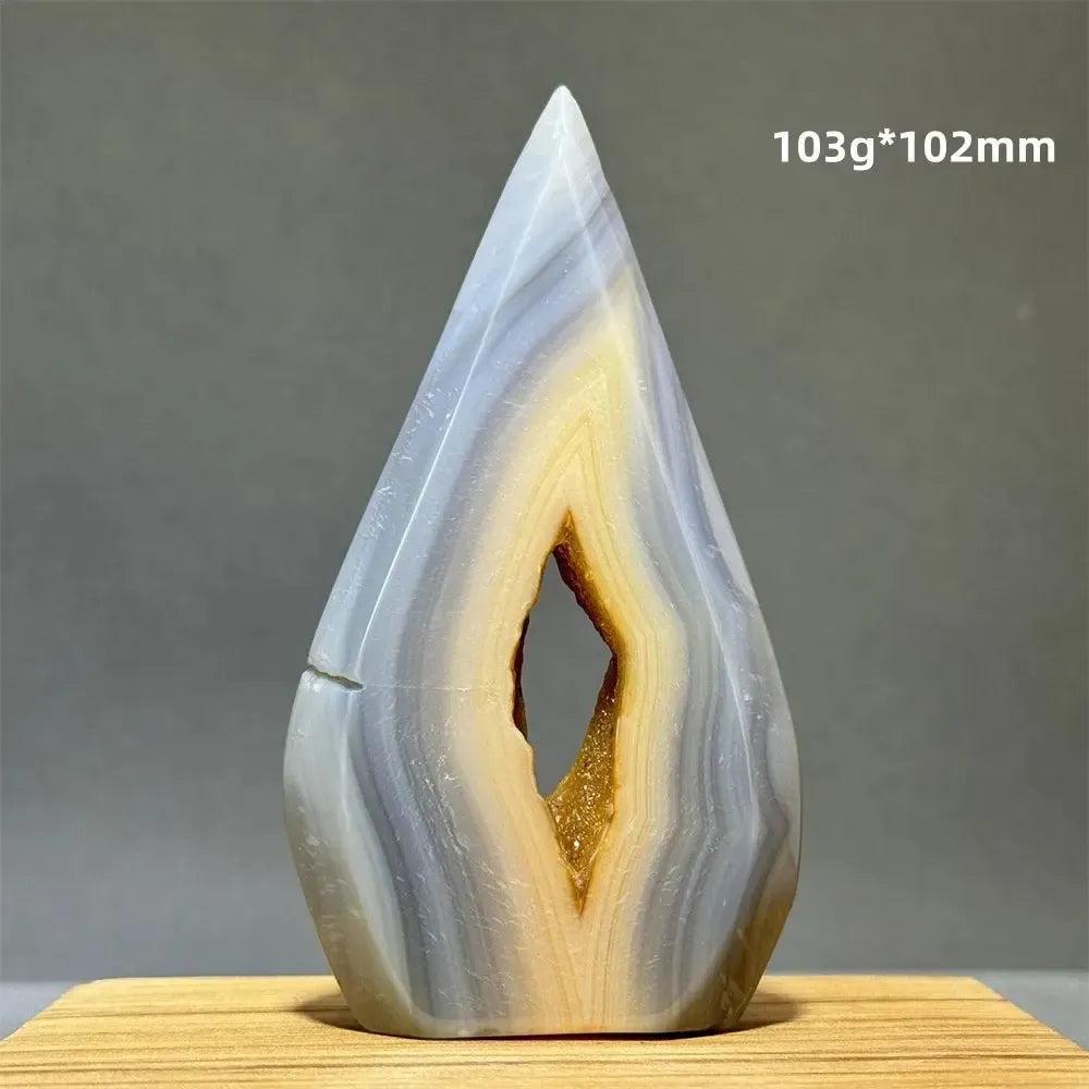 Yellow Agate freeform cave torch from Crystal Destiny, showing warm golden-yellow and grey bands with a natural hollow.