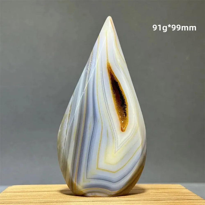 Yellow Agate freeform cave torch from Crystal Destiny, with banded layers and a natural hollow.