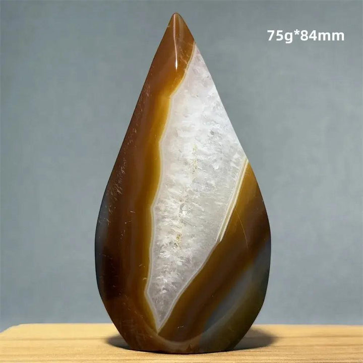 Yellow Agate freeform cave torch by Crystal Destiny, 75g, 84mm, with warm golden-brown bands and a white crystalline interior.