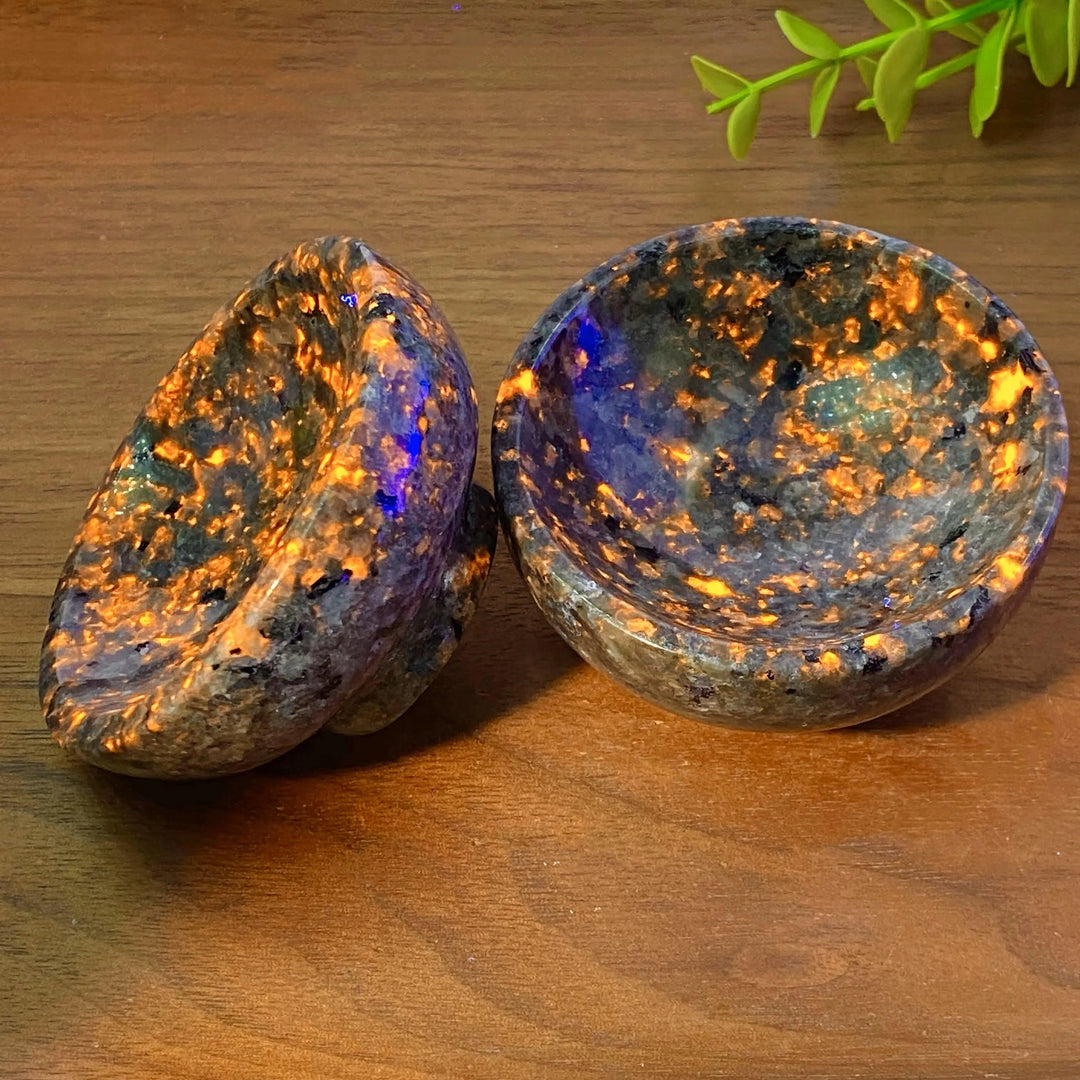 Yooperlite Crystal Bowl: UV reactive glowing stone dish with vivid orange and gold flame-like patterns.