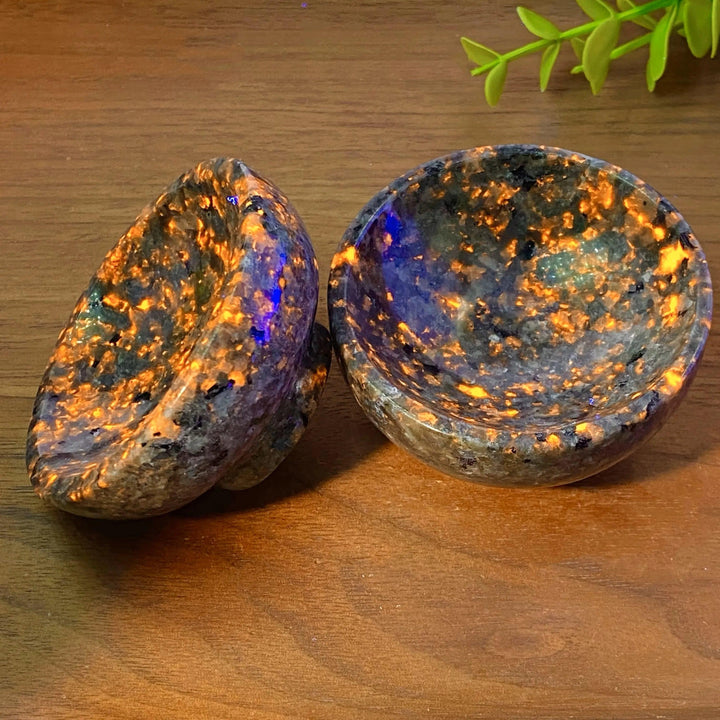 Yooperlite Crystal Bowl: UV reactive glowing stone dish with vivid orange and gold flame-like patterns.
