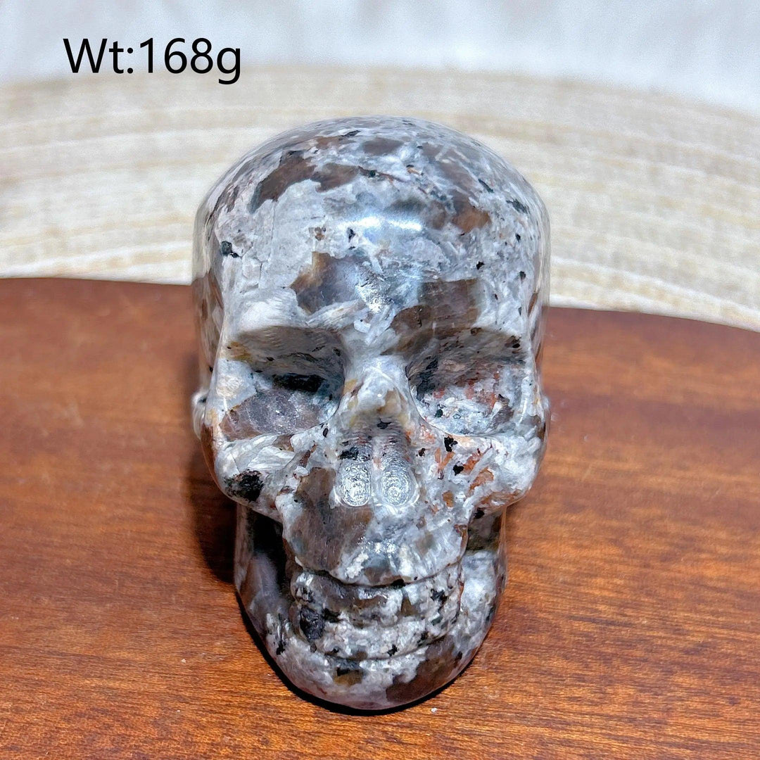 Yooperlite Crystal Carved Skull, a beautifully detailed grey stone for protection and grounding.
