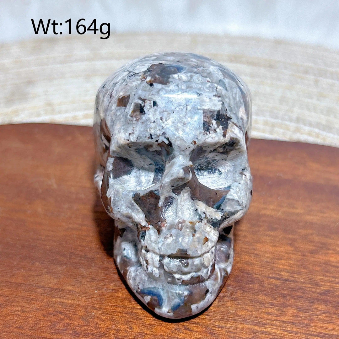 Yooperlite Crystal Carved Skull: Detailed grey stone skull, 164g, for grounding and protection.