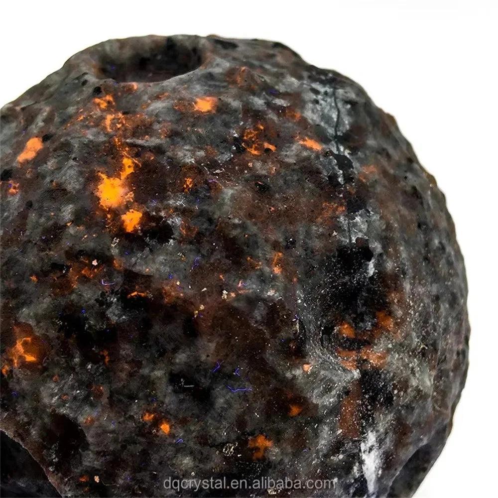 Natural Yooperlite moon sphere with glowing orange inclusions for Reiki healing, spiritual energy, and chakra balancing.