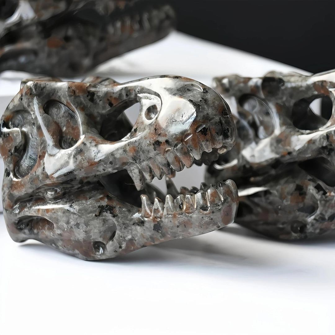 Yooperlite T-Rex skull carving, gray and brown, UV reactive, for protection and grounding.