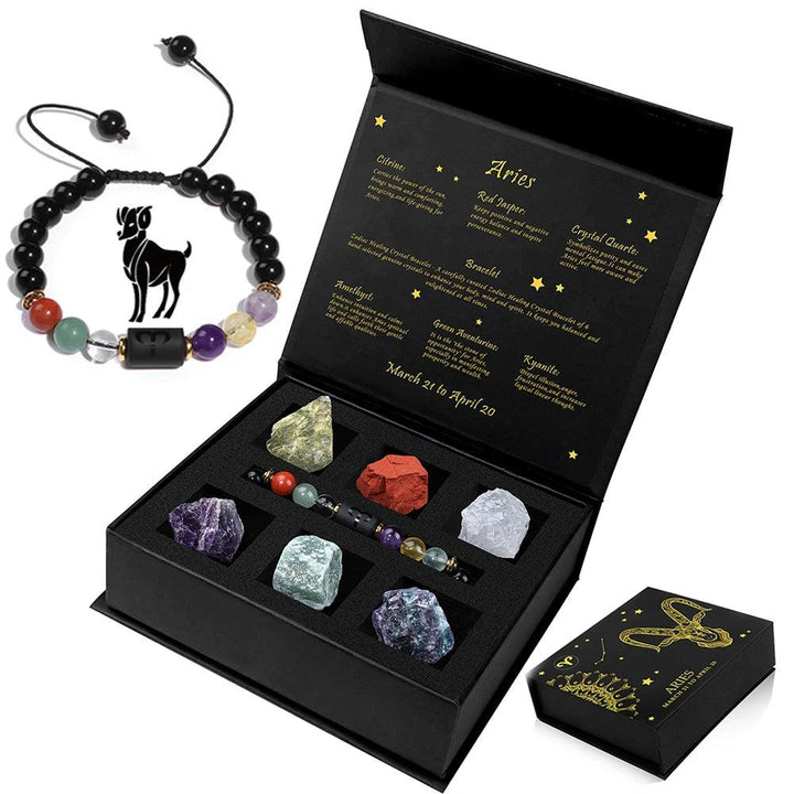 Aries Zodiac Crystal Gift Box with a black beaded bracelet, raw healing stones, and a descriptive insert.