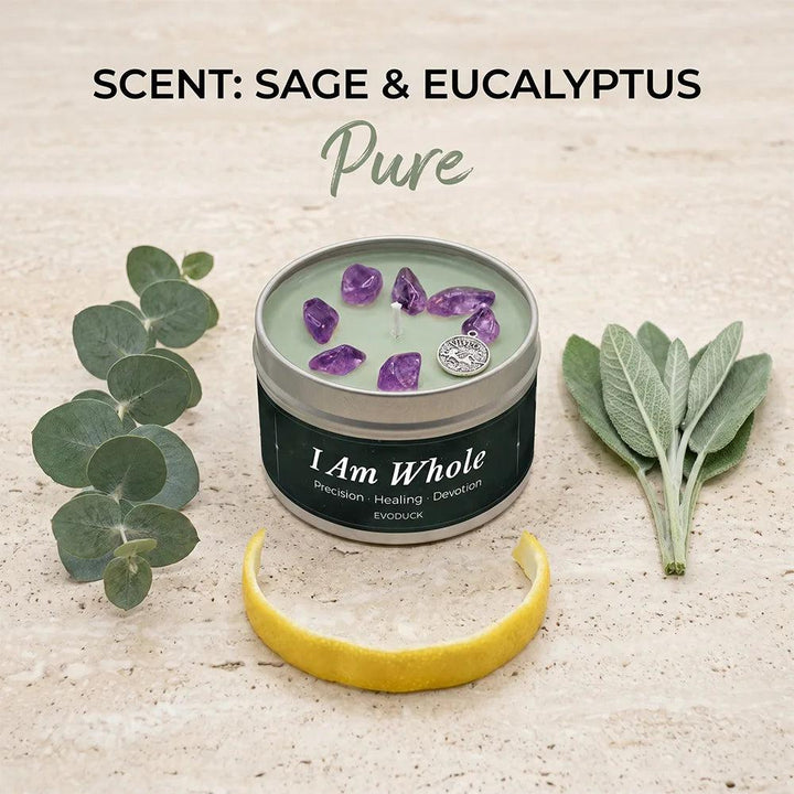 I Am Whole" Sage & Eucalyptus candle in a tin with amethyst crystals, eucalyptus, sage, and lemon peel.