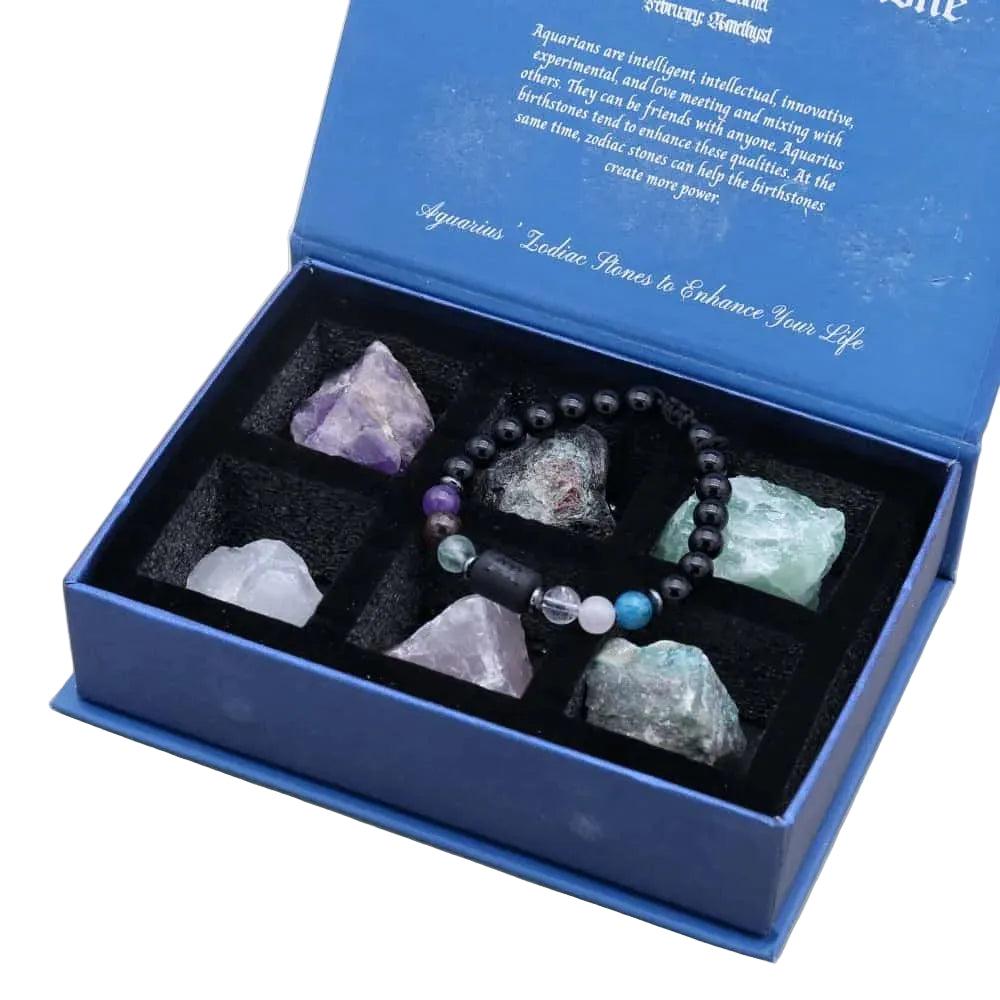 Aquarius Zodiac Crystals & Bracelet gift set with Lapis Lazuli, Amethyst, and raw stones in a blue velvet-lined box.
